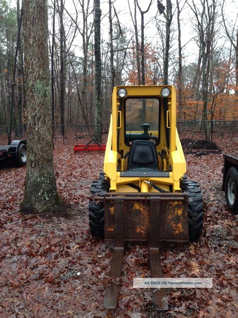 john deere 575 skid steer new holland|value john deere skid steer.